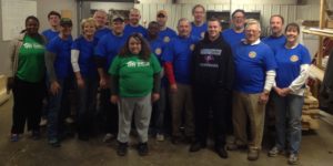 Rotary Club of Lexington members volunteer at Habitat for Humanity.